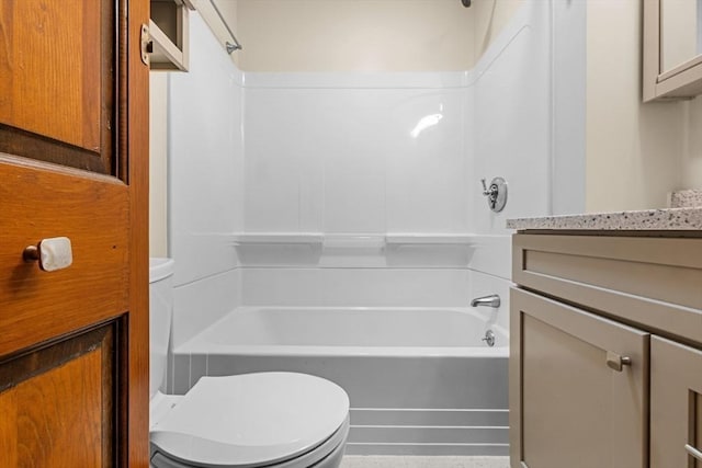 full bath with vanity, bathtub / shower combination, and toilet