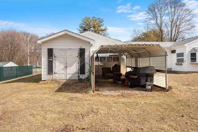 view of shed with fence