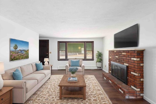 living area featuring a fireplace, wood finished floors, baseboards, and a baseboard radiator