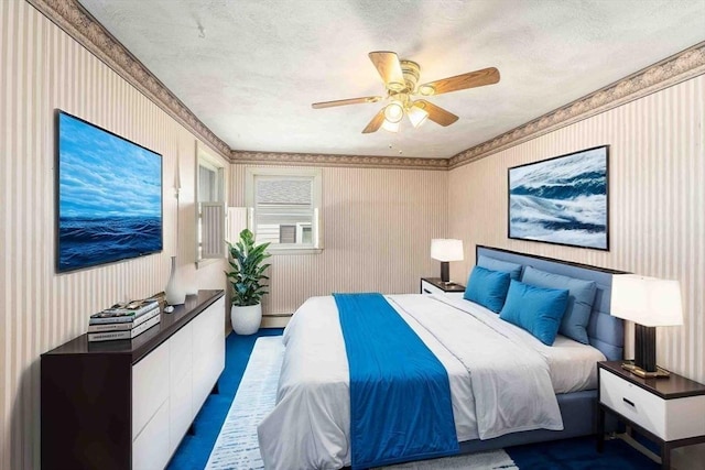 bedroom featuring wallpapered walls, a ceiling fan, baseboard heating, and a textured ceiling