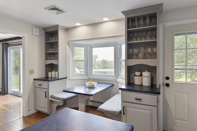 27 N Brigham Hill Rd, Grafton, MA 01536 - dining space featuring a baseboard radiator, dark wood-type flooring, and breakfast area