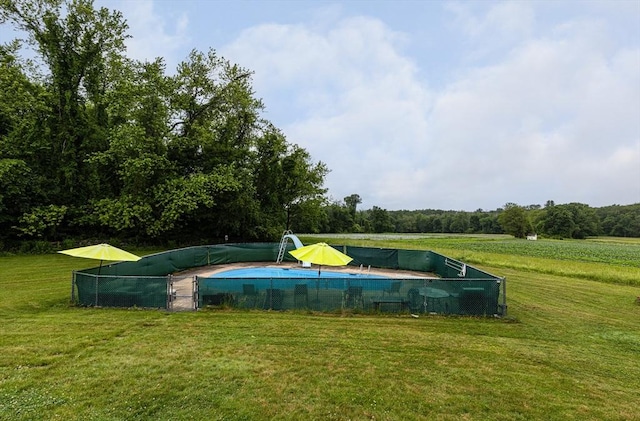 27 N Brigham Hill Rd, Grafton, MA 01536 - view of swimming pool featuring a lawn and a covered pool