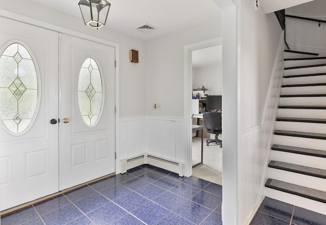 27 N Brigham Hill Rd, Grafton, MA 01536 - foyer featuring wainscoting, stairs, and a baseboard heating unit