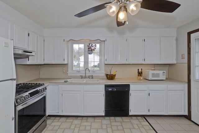 kitchen featuring white appliances, ceiling fan, under cabinet range hood, white cabinets, and a sink