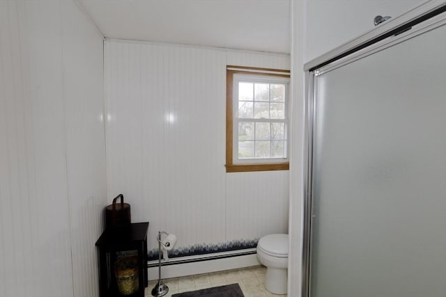 bathroom featuring an enclosed shower, toilet, and a baseboard radiator