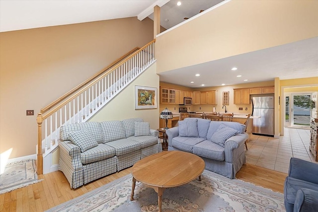 3 Angell Brook Dr Unit 3, West Boylston, MA 01583 - living area with beam ceiling, light wood finished floors, high vaulted ceiling, and recessed lighting