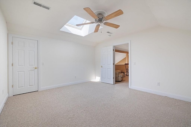 3 Angell Brook Dr Unit 3, West Boylston, MA 01583 - unfurnished bedroom featuring a skylight, vaulted ceiling, light carpet, and ceiling fan