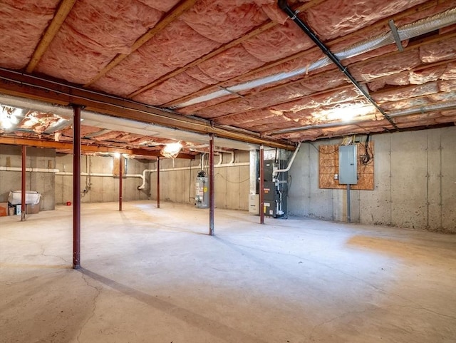 3 Angell Brook Dr Unit 3, West Boylston, MA 01583 - unfinished below grade area featuring heating unit, electric panel, and gas water heater