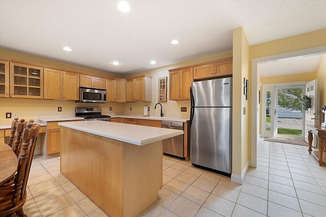 3 Angell Brook Dr Unit 3, West Boylston, MA 01583 - kitchen featuring appliances with stainless steel finishes, light countertops, recessed lighting, a center island, and glass insert cabinets