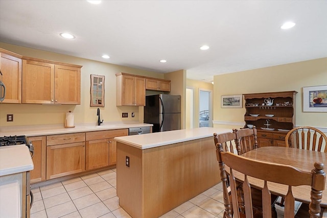 3 Angell Brook Dr Unit 3, West Boylston, MA 01583 - kitchen with stainless steel appliances, light countertops, light tile patterned floors, recessed lighting, and a center island