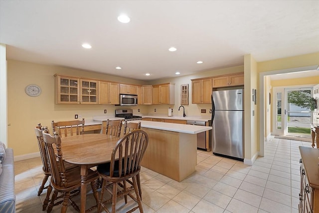 3 Angell Brook Dr Unit 3, West Boylston, MA 01583 - kitchen with appliances with stainless steel finishes, light countertops, recessed lighting, glass insert cabinets, and light tile patterned flooring