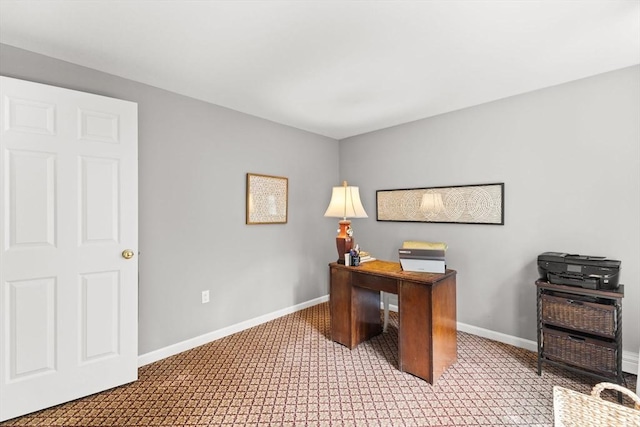 home office featuring baseboards and carpet floors