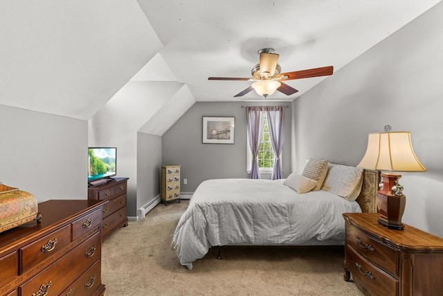 bedroom featuring a baseboard heating unit, light colored carpet, ceiling fan, vaulted ceiling, and baseboards