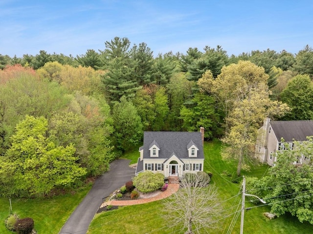 view from above of property featuring a forest