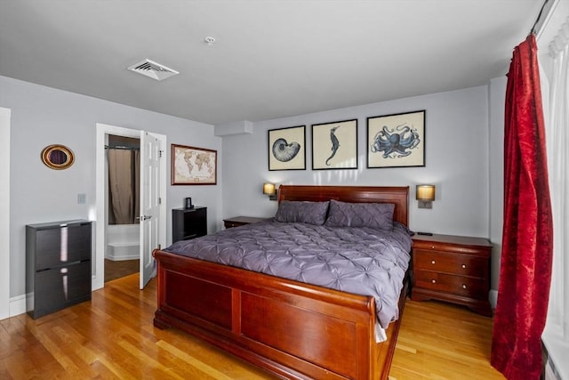 bedroom featuring light hardwood / wood-style floors