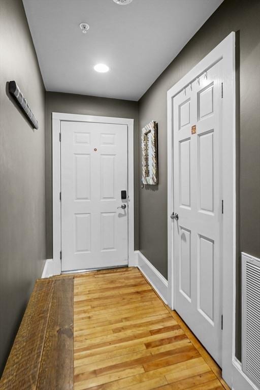 entryway featuring hardwood / wood-style flooring