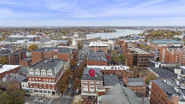 birds eye view of property featuring a water view