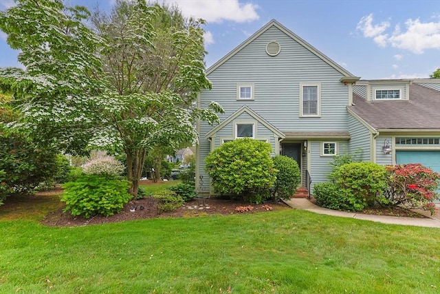 2 Darby Pt Unit 2, Mashpee, MA 02649 - view of front of home with a front yard and a shingled roof