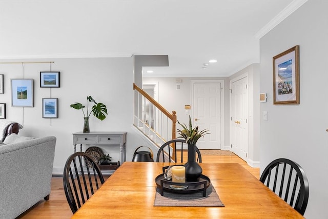 2 Darby Pt Unit 2, Mashpee, MA 02649 - dining area featuring ornamental molding, light wood-style floors, recessed lighting, and stairway