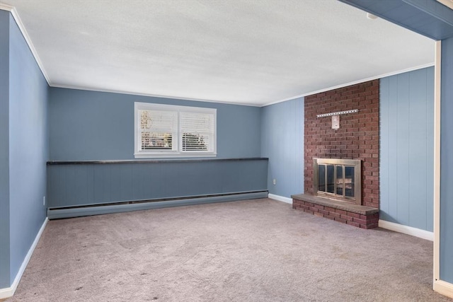 unfurnished living room featuring ornamental molding, carpet flooring, a baseboard radiator, a brick fireplace, and baseboards