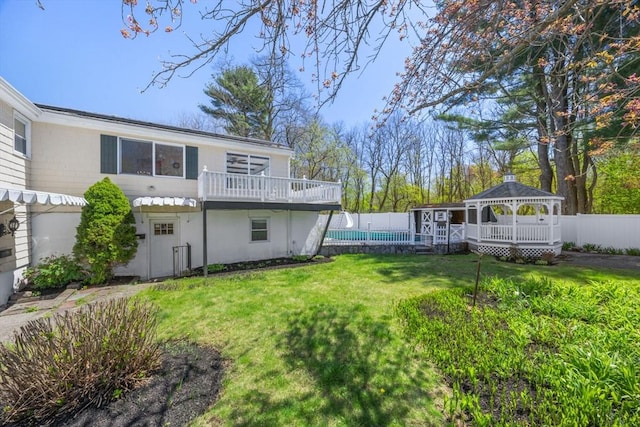 view of yard featuring a gazebo and a deck