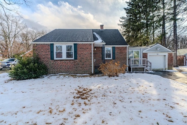 bungalow featuring a garage