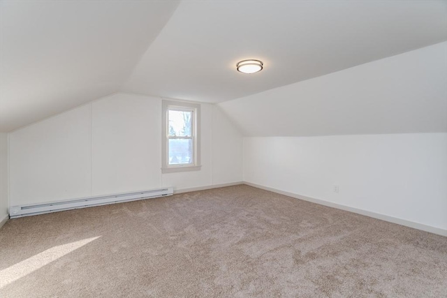 bonus room with baseboard heating, lofted ceiling, and carpet floors