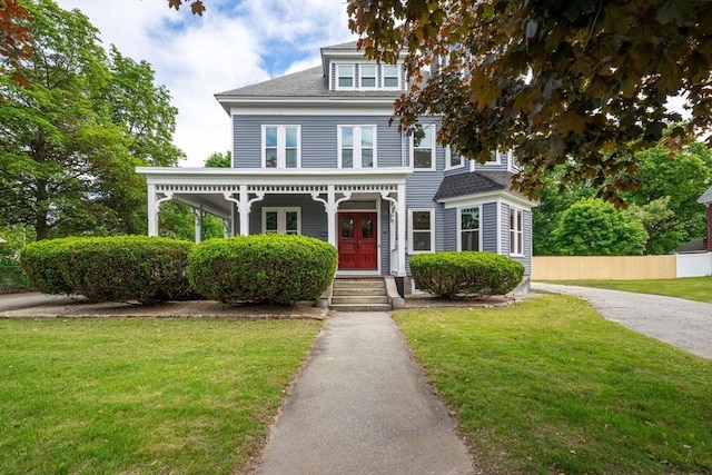 42 Middlesex St, Chelmsford, MA 01863 - view of front of property featuring covered porch and roof with shingles