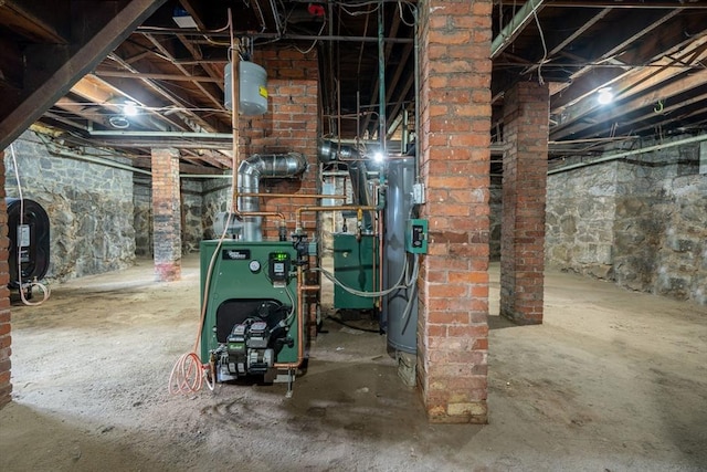 42 Middlesex St, Chelmsford, MA 01863 - unfinished below grade area with oil tank and a heating unit