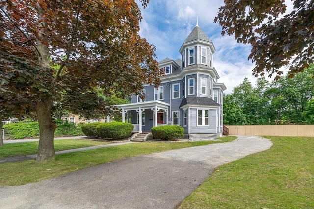 42 Middlesex St, Chelmsford, MA 01863 - victorian-style house with driveway and a porch