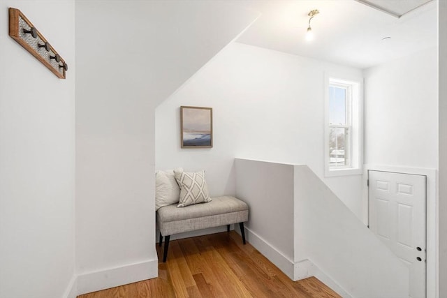 living area with hardwood / wood-style floors