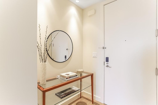 foyer entrance with baseboards