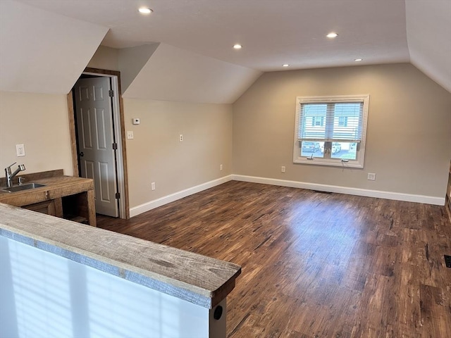 35 E Glen Dr, Westfield, MA 01085 - kitchen with a sink, dark wood-type flooring, lofted ceiling, baseboards, and recessed lighting