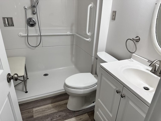 35 E Glen Dr, Westfield, MA 01085 - full bathroom with a shower stall, vanity, wood finished floors, and toilet
