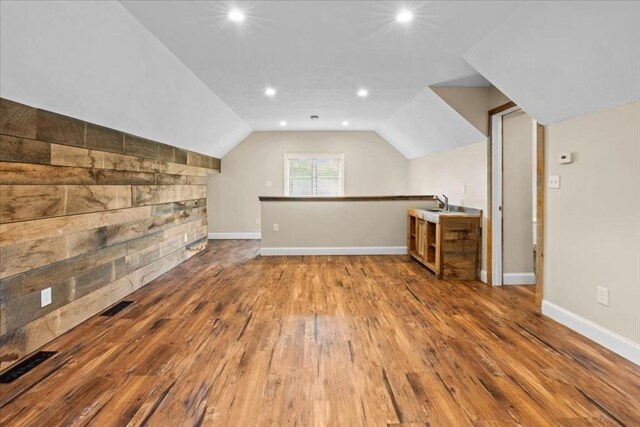 35 E Glen Dr, Westfield, MA 01085 - bonus room with hardwood / wood-style flooring, recessed lighting, vaulted ceiling, and baseboards