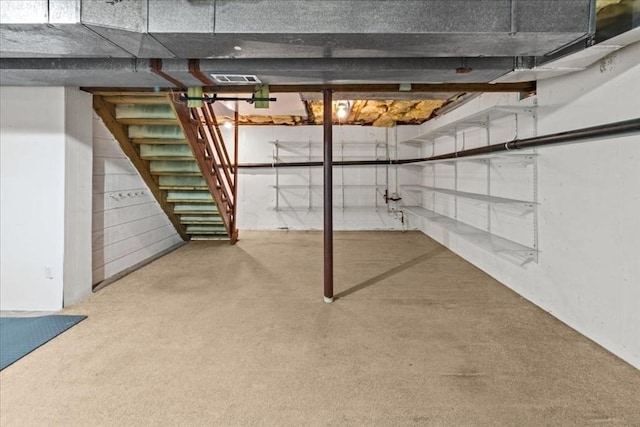 35 E Glen Dr, Westfield, MA 01085 - unfinished below grade area featuring stairway and carpet flooring