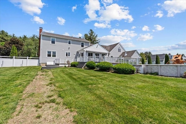 35 E Glen Dr, Westfield, MA 01085 - back of house with a wooden deck and a chimney