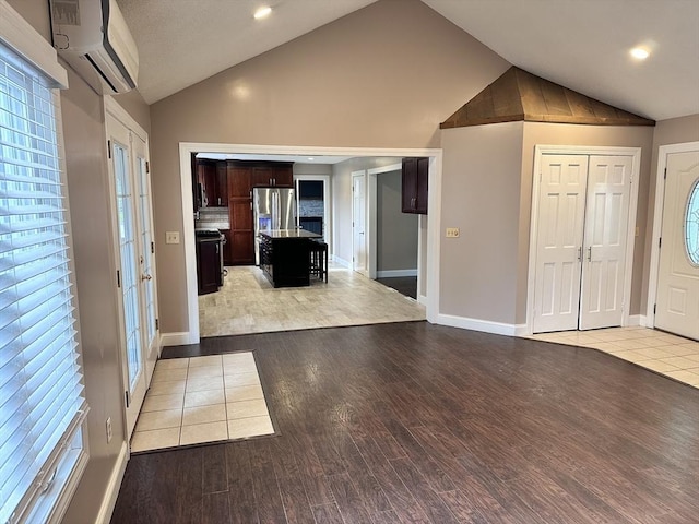 35 E Glen Dr, Westfield, MA 01085 - entryway featuring an AC wall unit, light wood-style floors, healthy amount of natural light, baseboards, and recessed lighting