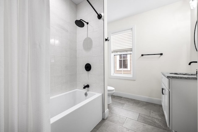 bathroom with shower / bath combo with shower curtain, baseboards, toilet, and vanity