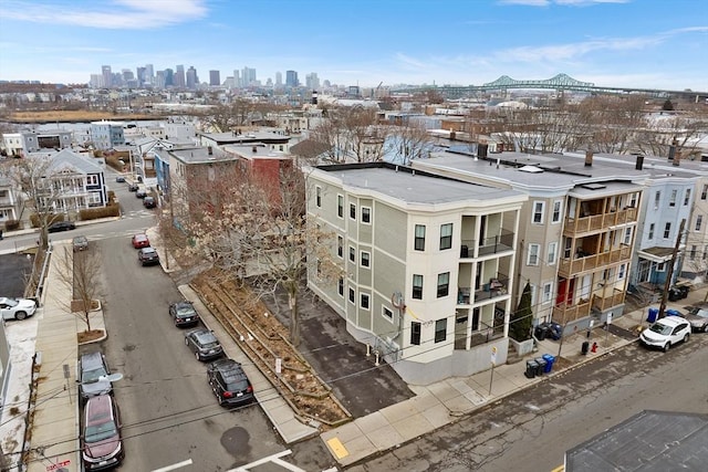 birds eye view of property with a city view