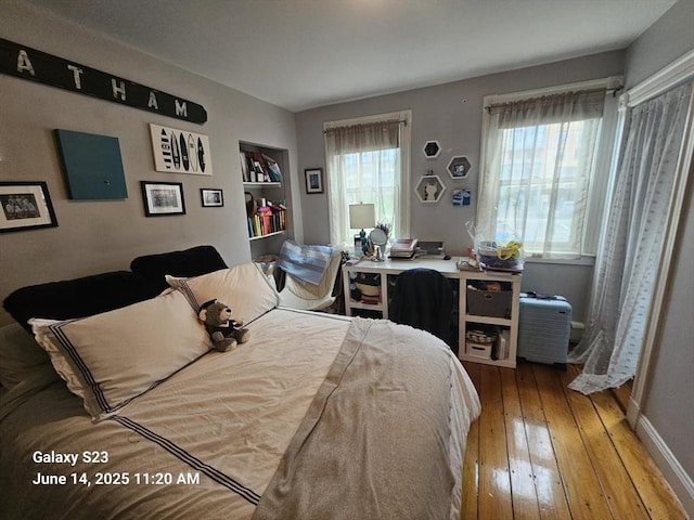 6 Stillman Pl, Boston, MA 02113 - bedroom with multiple windows and hardwood / wood-style flooring