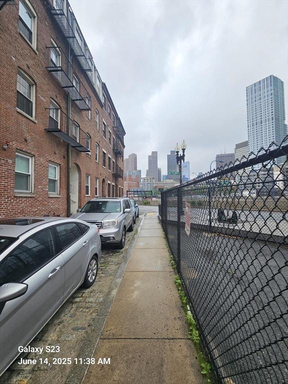 6 Stillman Pl, Boston, MA 02113 - view of asphalt road with a view of city and sidewalks