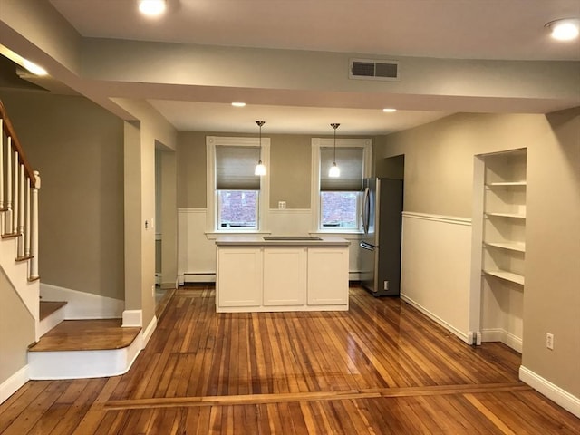 6 Stillman Pl, Boston, MA 02113 - kitchen featuring freestanding refrigerator, dark wood-style floors, black electric cooktop, dark countertops, and recessed lighting