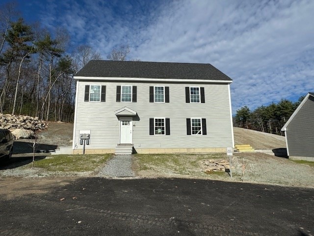 view of front of property with entry steps