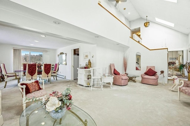 carpeted living area with high vaulted ceiling, a skylight, arched walkways, and recessed lighting