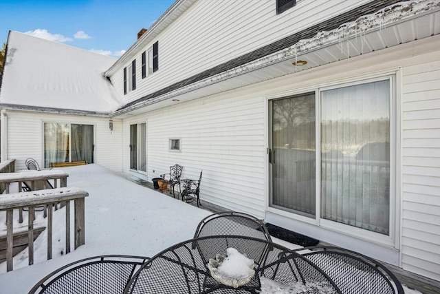 view of snow covered patio