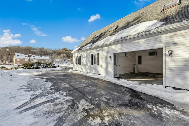 view of snow covered property