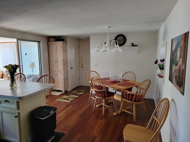 115 Captain Chase Rd, Yarmouth, MA 02664 - dining area with wood finished floors, a textured ceiling, and a chandelier
