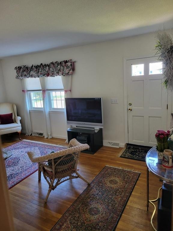 115 Captain Chase Rd, Yarmouth, MA 02664 - living room with wood finished floors and baseboards