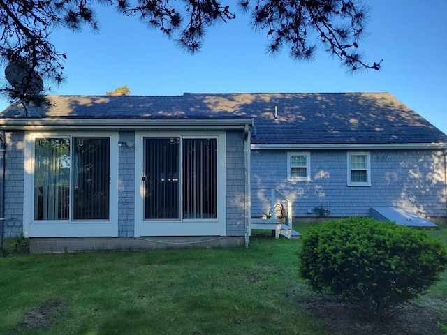 115 Captain Chase Rd, Yarmouth, MA 02664 - rear view of property with a yard and roof with shingles